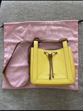 kate spade Yellow Pebbled Leather Drawstring Crossbody with Tan Strap